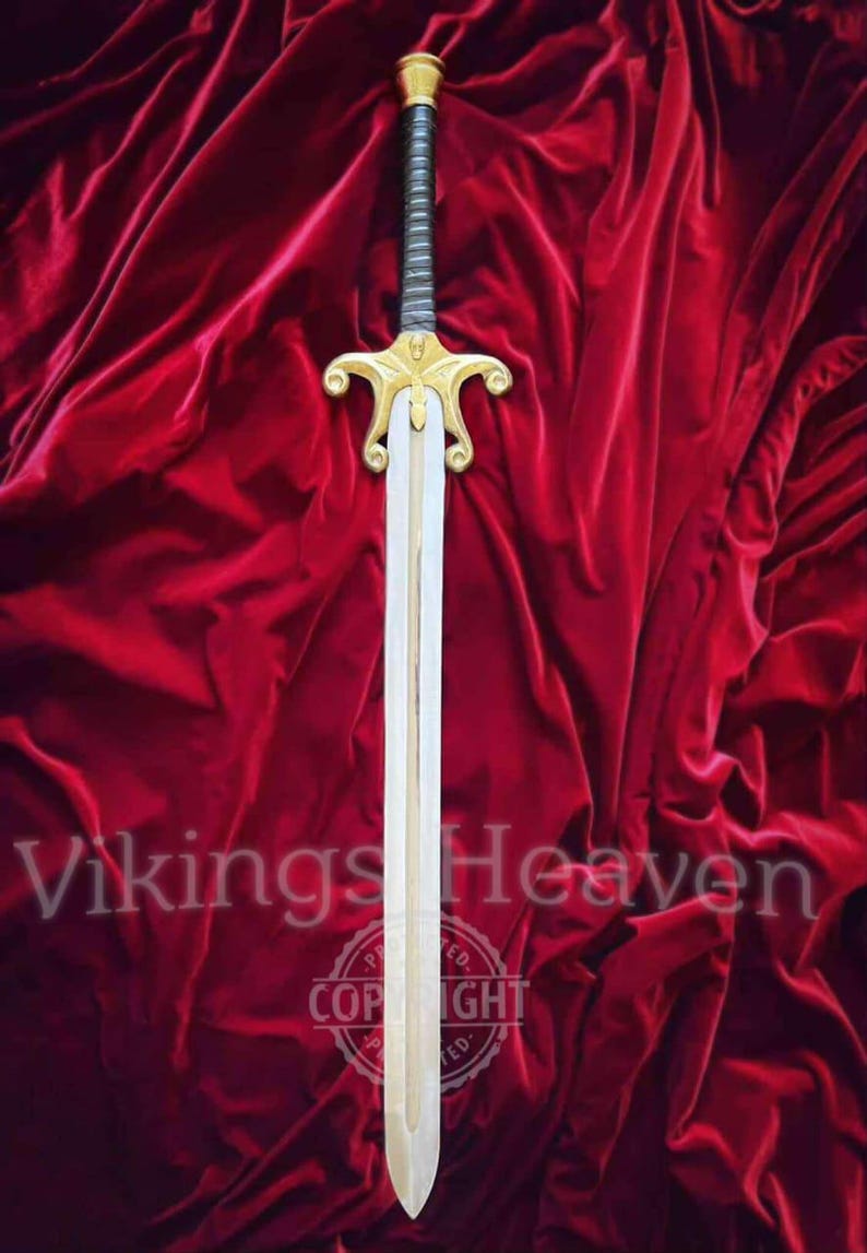 Fully handmade He-Man Power Sword replica with a carbon steel blade, solid brass guard and pommel, inspired by the Masters of the Universe movie. High-quality fantasy sword perfect for cosplay, display, or as a collectible gift for fans of classic 80s heroes.