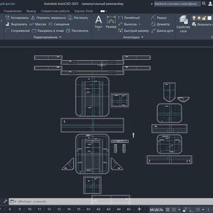 May include: A computer screen displays a technical drawing in white lines on a dark background. The drawing appears to be a blueprint or schematic, with various geometric shapes and lines. The software interface is visible at the top.