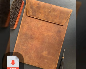 May include: A brown leather laptop sleeve with a flap closure. The sleeve has a distressed look and is made of high-quality leather.