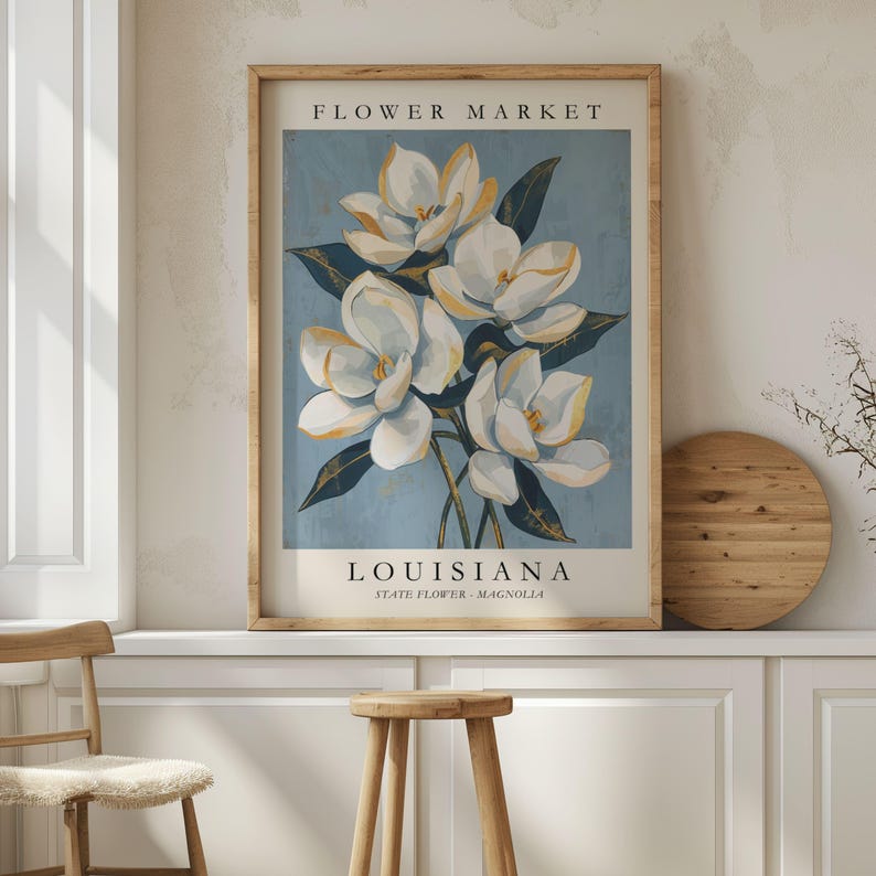 Louisiana Flower Market poster featuring the state flower Magnolia, elegant white blossoms with golden highlights and deep green leaves against a soft blue textured background in vintage botanical art style.