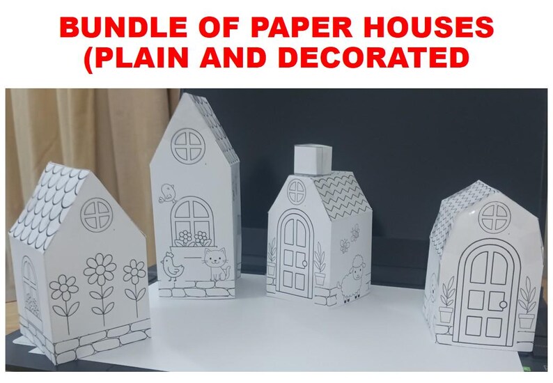 May include: A bundle of four white paper houses with black line art illustrations. The text BUNDLE OF PAPER HOUSES (PLAIN AND DECORATED) appears above the houses. Each house features distinct drawings of flowers, animals, doors, and windows.