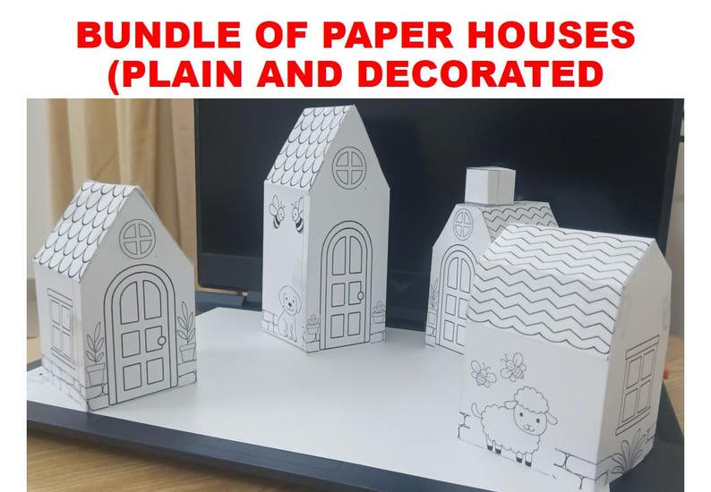 May include: A bundle of four white paper houses with black line art illustrations. The houses feature various designs including arched doors, windows, roof shingles, bees, a dog, and a sheep. The text BUNDLE OF PAPER HOUSES (PLAIN AND DECORATED) is visible.