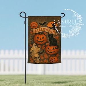 May include: A Halloween garden flag with pumpkins, a black cat, a ghost, and a skull. The flag has the word "HALLOWEEN" on it, with a witch flying in front of a full moon. The flag is on a black metal stand.