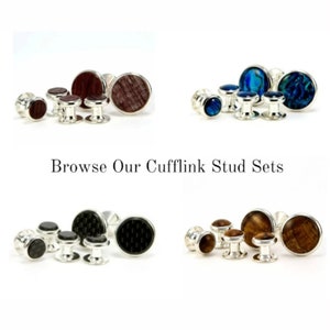May include: Set of four cufflinks and four shirt studs in various materials, including wood, carbon fiber, and abalone shell. Browse Our Cufflink Stud Sets.