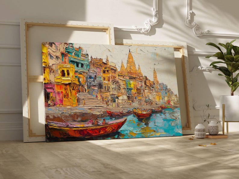 May include: A colorful painting of a cityscape with buildings and temples along a river. The painting features boats on the water and a bright blue sky.
