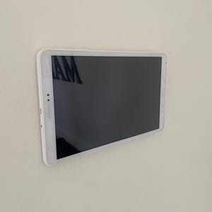 INVISIBLE TABLET MOUNT, Tablet Wall Mount for iPad, Samsung, Fire | Minimalist Wall Holder with Charging Slot & Adhesive, Smart Display Dock