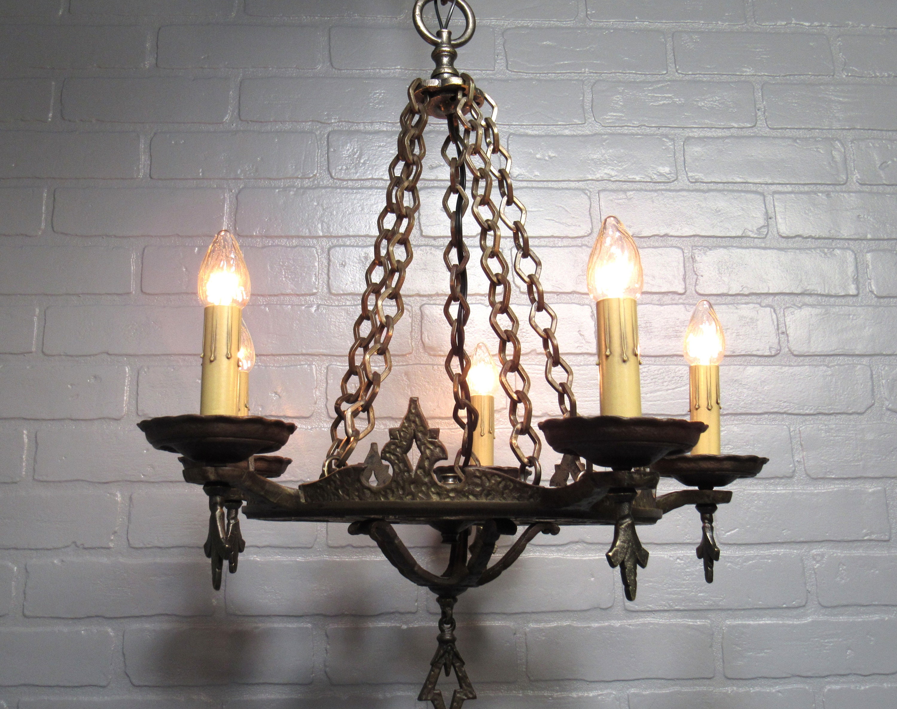 Cast iron cheap chandelier antique