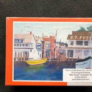 Main Street, Greenport, NY 285 Piece Puzzle Art by Bob Kuhne North Fork artist Claudio&#39;s Preston&#39;s waterfront Dock Wharf Sailboat Boat Store