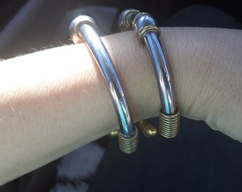 Vintage armband i sterlingsilver med mässingsdetaljer, set om två