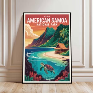 May include: A framed travel poster for American Samoa National Park. The artwork features a beach scene with a turtle swimming in the foreground, a hut, palm trees, and mountains. The text reads "Visit American Samoa National Park."