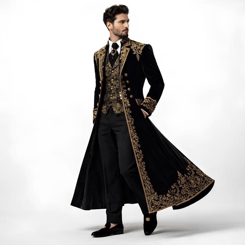 May include: A black velvet coat with gold embroidery, a matching vest, black pants, and black shoes. The coat features ornate gold detailing along the edges, collar, and cuffs. The vest has a gold brocade pattern. The outfit is formal and elegant.