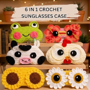 Puede incluir: Una colección de seis estuches de ganchillo para gafas de sol con varios diseños, incluyendo una rana, una vaca, un pollo, un girasol y una margarita. Los estuches son de colores brillantes como verde, amarillo, blanco y rosa. El texto "6 IN 1 CROCHET SUNGLASSES CASE" se muestra en la parte superior.