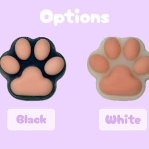 May include: Two paw-shaped designs, one black and one white, with pink pads. The word "Options" is at the top, and the words "Black" and "White" are below the paw prints. The background is a light purple color.