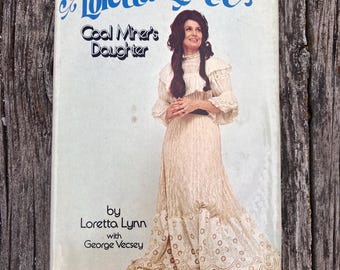 La hija del minero de carbón de Loretta Lynn, por Loretta Lynn con George Vecsey, 1976. Libro clásico.