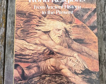 Op de afbeelding: Een paperbackboek getiteld World Religions: From Ancient History to the Present, onder redactie van Geoffrey Parrinder. De omslag bevat een bruine illustratie van een bebaarde figuur die naar een liggend persoon reikt tegen een donkere achtergrond.