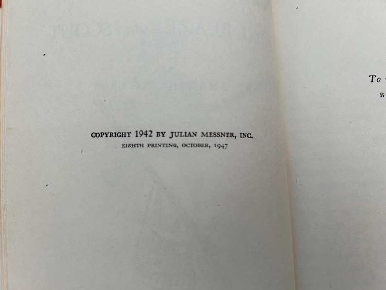 May include: A book page featuring black printed text that reads COPYRIGHT 1942 BY JULIAN MESSNER, INC. and EIGHTH PRINTING, OCTOBER, 1947. The page is off-white with a smooth texture and visible margins on the left and right sides.