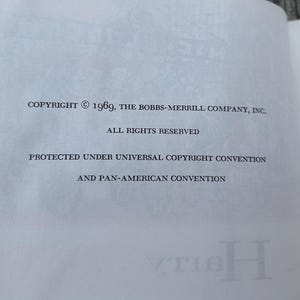May include: A white book page featuring black printed text that reads: COPYRIGHT &copy; 1969, THE BOBBS-MERRILL COMPANY, INC. ALL RIGHTS RESERVED. PROTECTED UNDER UNIVERSAL COPYRIGHT CONVENTION AND PAN-AMERICAN CONVENTION. The text is centered on the page.