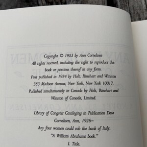 May include: The copyright page of a book featuring black text on a white background. The text includes: Copyright 1983 by Ann Cornelisen, First published in 1984 by Holt, Rinehart and Winston, and the title Any four women could rob the bank of Italy.