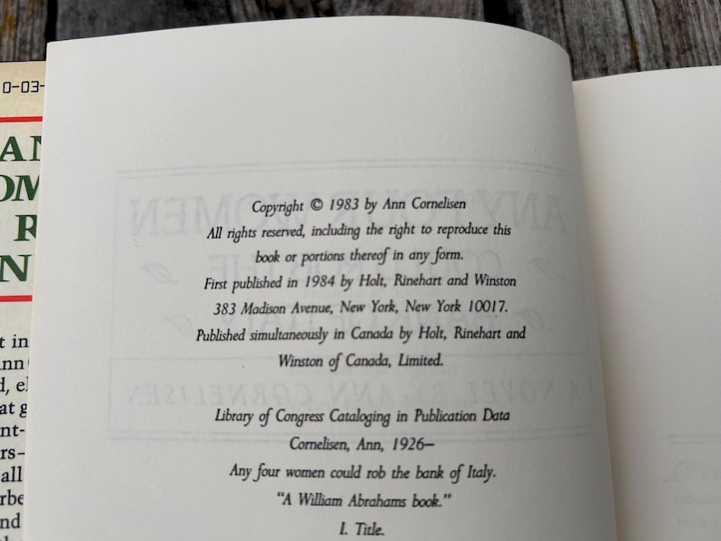 May include: The copyright page of a book featuring black text on a white background. The text includes: Copyright 1983 by Ann Cornelisen, First published in 1984 by Holt, Rinehart and Winston, and the title Any four women could rob the bank of Italy.
