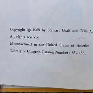 May include: A white book page featuring black printed text that reads: Copyright 1965 by Stewart Graff and Polly Anne Graff. All rights reserved. Manufactured in the United States of America. Library of Congress Catalog Number: 65-14550.