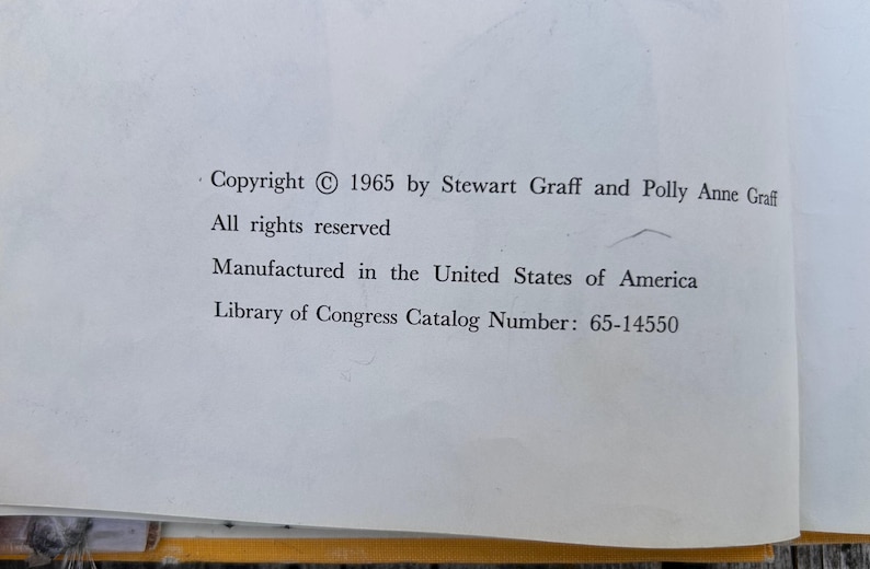 May include: A white book page featuring black printed text that reads: Copyright 1965 by Stewart Graff and Polly Anne Graff. All rights reserved. Manufactured in the United States of America. Library of Congress Catalog Number: 65-14550.