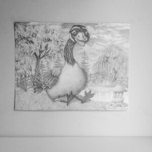 May include: A graphite pencil drawing on paper featuring a goose with a long neck and webbed feet standing in a landscape. The background includes a tree, a small bridge over water, and a stone lantern. The artwork is rendered in shades of gray.