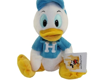 Peluche Disney tipo Bean Bag - Huey con camisa azul (Los patos de Donald) (7 pulgadas) (Etiquetas con la palabra 'Huwey' mal escrita)
