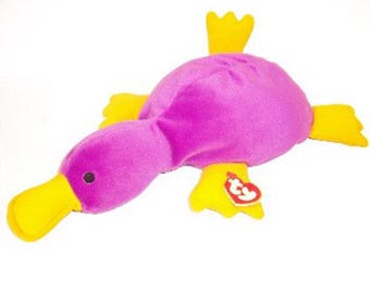 Coussin Ty - l'ornithorynque pagaie (version violette) (14 pouces) - mwmts