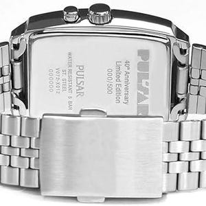 May include: A silver Pulsar watch with a rectangular face and a stainless steel strap. The watch back shows "40th Anniversary Limited Edition" and other details. Water resistant to 5 bar. The watch is a limited edition.