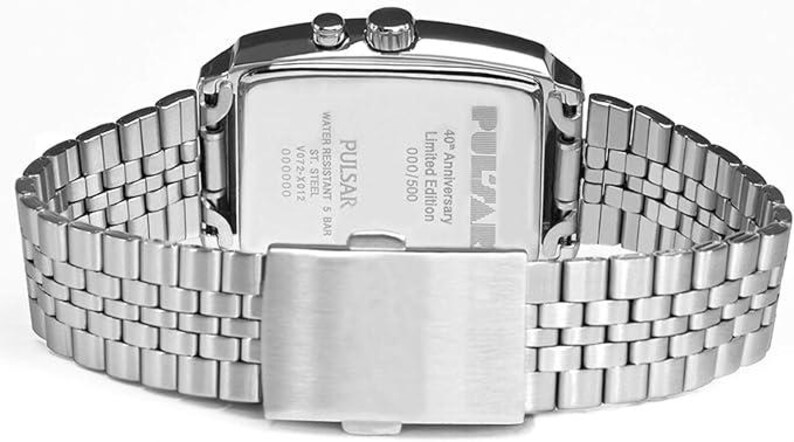May include: A silver Pulsar watch with a rectangular face and a stainless steel strap. The watch back shows "40th Anniversary Limited Edition" and other details. Water resistant to 5 bar. The watch is a limited edition.