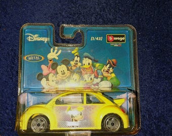 burago Disney Volkswagen New beetle vintage and rare quality made in italy.  Discontinued models so very rare especially I this packageing