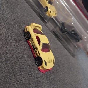 Assortment of loose vintage hotwheels from the 90s and earu 2000s Rare Collectables great gift for collectors or kids or any car intuseist