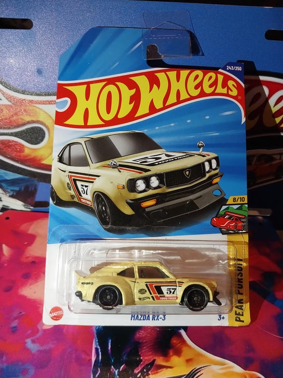 Hotwheels Gold Mazda RX-3 From Peak Pursuit Sub Series Long Card