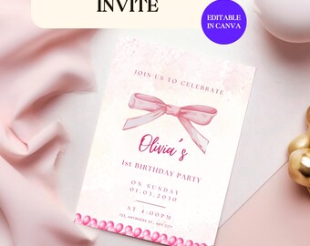 May include: Pink and white birthday party invitation with a pink bow and the text "Join us to celebrate Olivia's 1st Birthday Party on Sunday 01.03.2030 at 4:00PM 123, Anywhere St., Any City".