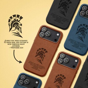 May include: A collection of smartphone cases in black, blue, and brown featuring a Spartan helmet graphic and the text: Surely you need guidance to wage war, and victory is won through many advisers. ~ Proverbs 24:6. Each case has a triple camera cutout.