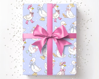 May include: A wrapped gift with light blue wrapping paper featuring a pattern of cartoon geese wearing hats and boots. A pink ribbon and bow are tied around the gift. The text "Horde Mentality" is in the upper right corner.