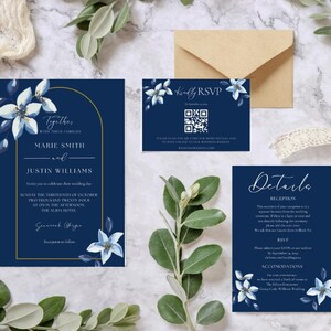 May include: Navy blue wedding invitation suite with floral accents. The suite includes an invitation, RSVP card, and details card, all featuring white flowers and gold accents. The invitation reads "Together" and lists the names Marie Smith and Justin Williams.