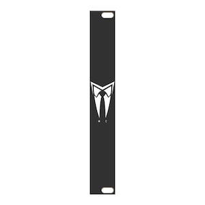 May include: Black metal rack with a white tie and collar design and the letters "M.C." printed below.
