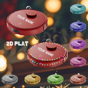 May include: Red and multi-colored robot vacuum Christmas ornaments with the text "YOUR NAME". The ornaments are round with a small loop for hanging. The image also shows several other color variations.