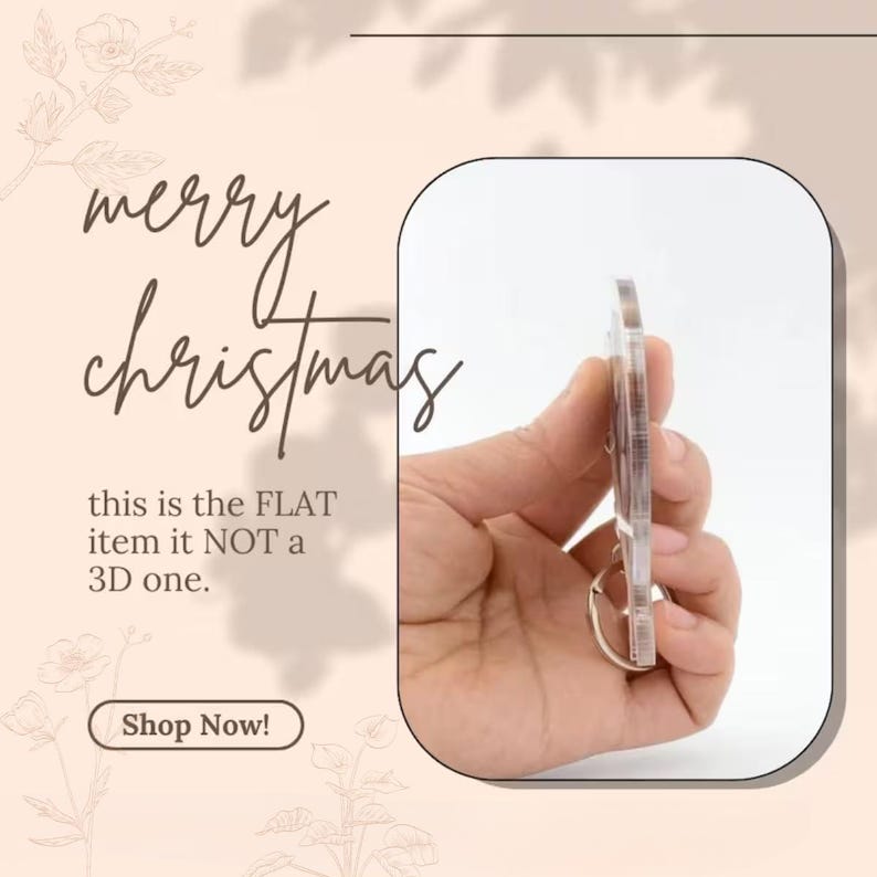 May include: A clear, flat keychain held by a hand, with a gold-colored keyring. The image includes the text "merry christmas" and "this is the FLAT item it NOT a 3D one." A "Shop Now!" button is also visible.
