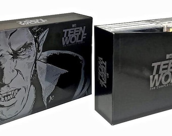 May include: A black DVD box set for the TV show "Teen Wolf" with a werewolf illustration on the front and the text "Teen Wolf The Complete Series" on the side.