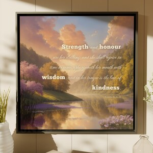May include: A framed art print depicting a tranquil lake scene surrounded by mountains and trees. The artwork includes the text "Strength and honour are her clothing; and she shall rejoice in time to come. She openeth her mouth with wisdom; and in her tongue is the law of kindness."