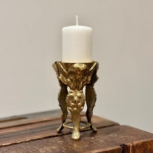 Vintage Solid Brass Footed Candle Holder for Pillar Candle or Tea Light featuring an Art Nouveau Cherub Design
