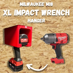May include: Red Milwaukee M18 XL Impact Wrench Hanger. The image shows a red impact wrench holder with a black and red impact wrench. The text "Milwaukee M18 XL Impact Wrench Hanger" is displayed at the top.