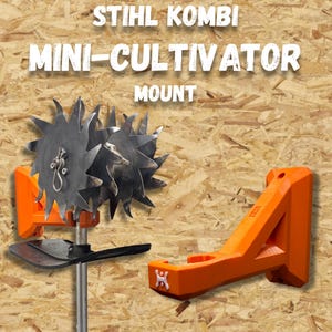 May include: An orange STIHL Kombi Mini-Cultivator Mount is displayed against a wood-grain background. The mount includes a metal cultivator head with jagged blades and a black blade. The text "STIHL KOMBI MINI-CULTIVATOR MOUNT" is visible.