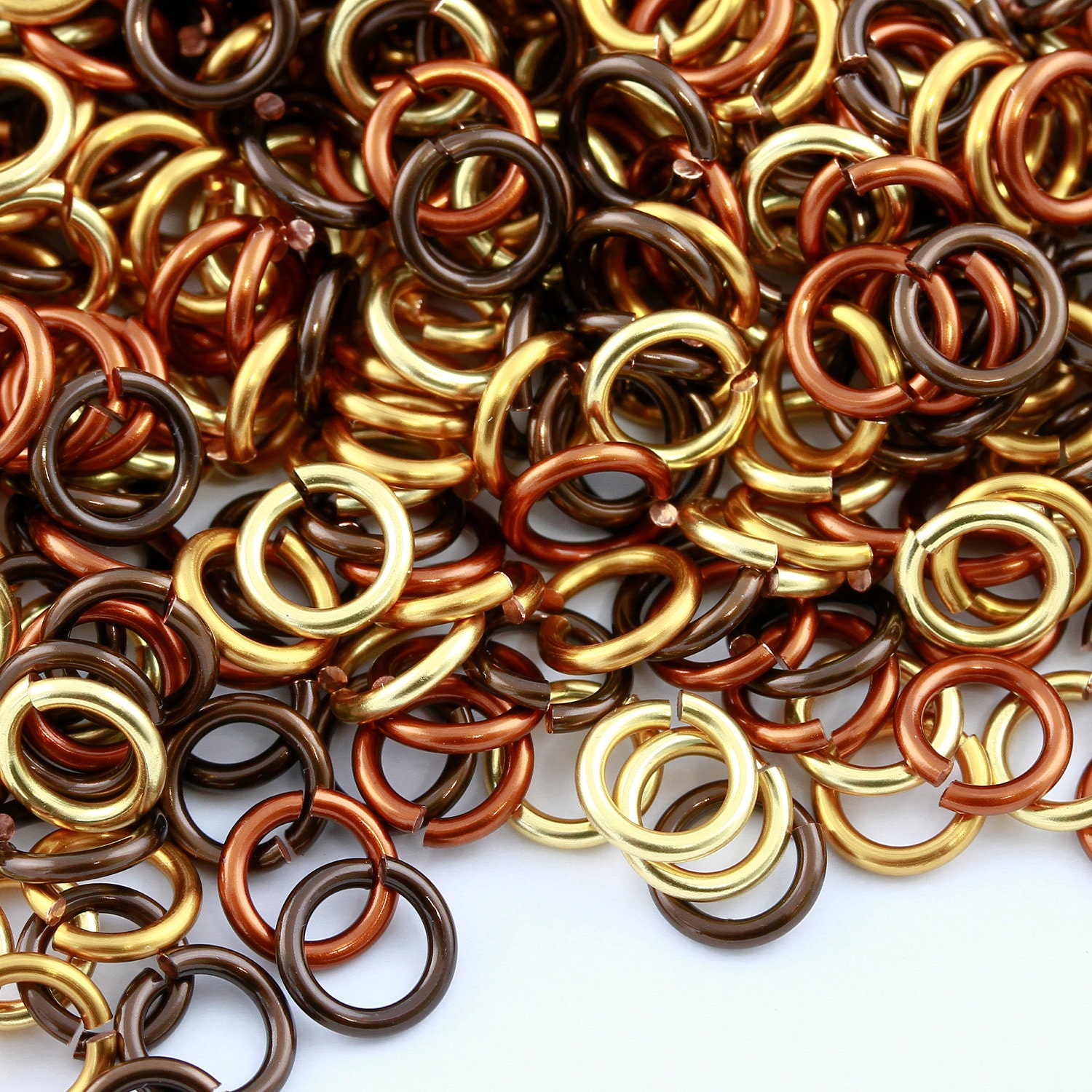 Enameled copper outlet jump rings