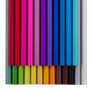 May include: A set of coloured pencils arranged in a rainbow pattern. The pencils are all the same size and shape, and they are arranged in a row from left to right. The pencils are all sharpened and ready to use.