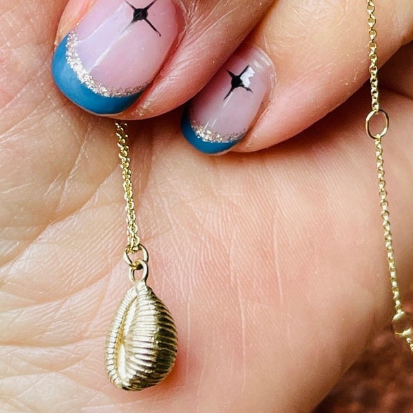 Tiny solid gold Cowrie seashore necklace