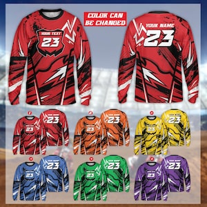 May include: Long-sleeved athletic shirts in various colors, featuring a racing-style design with the number 23 and customizable text. The shirts have a red, black, and white color scheme, with the text "COLOR CAN BE CHANGED".