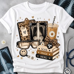 May include: A white t-shirt featuring a graphic print of a leopard-print clipboard with an X-ray, a coffee cup with a daisy, leopard-print glasses, a smiley face badge, and a stack of three books labelled SCAN, IMAGE, and HEAL with a bow.